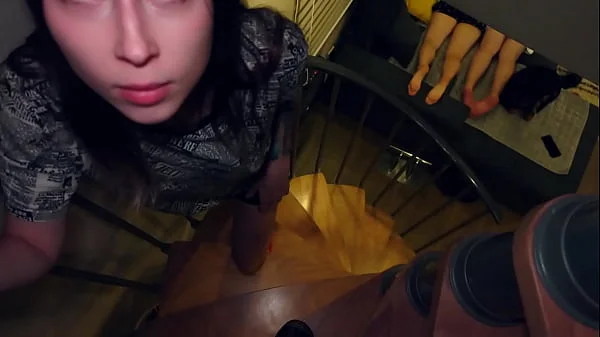 Stepsister gives stepbrother a blowjob while parents watch porn